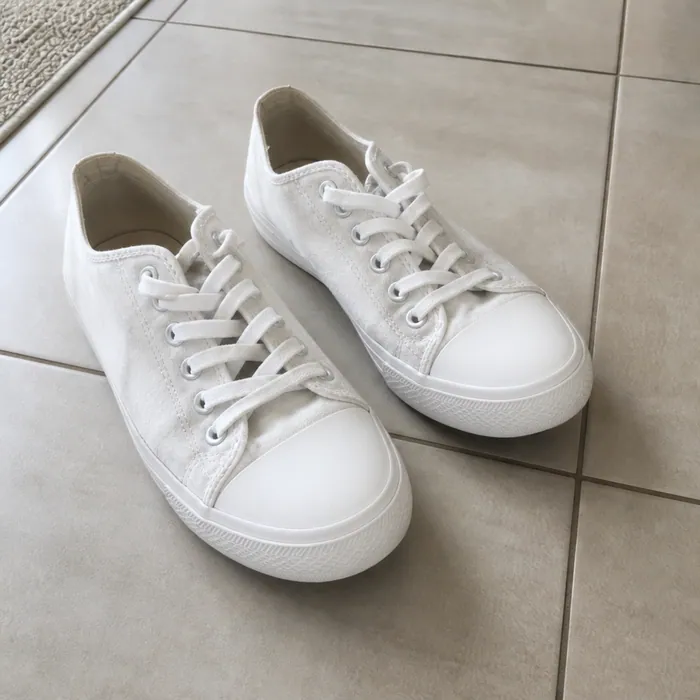 The same trainers with the rubber and canvas cleaned up