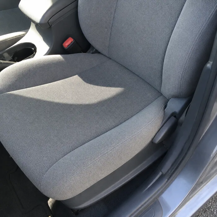 The same car seat with the upholstery cleaned
